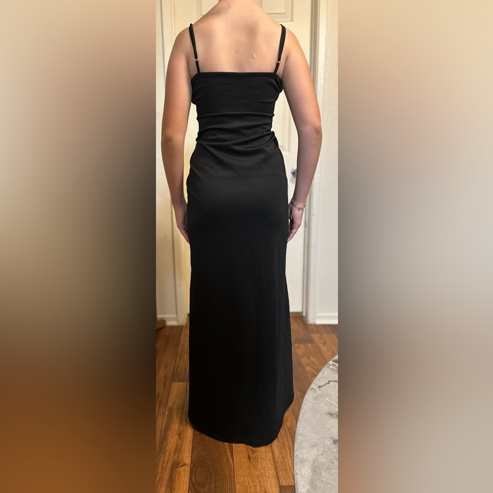 Black silk like gown. Side slit